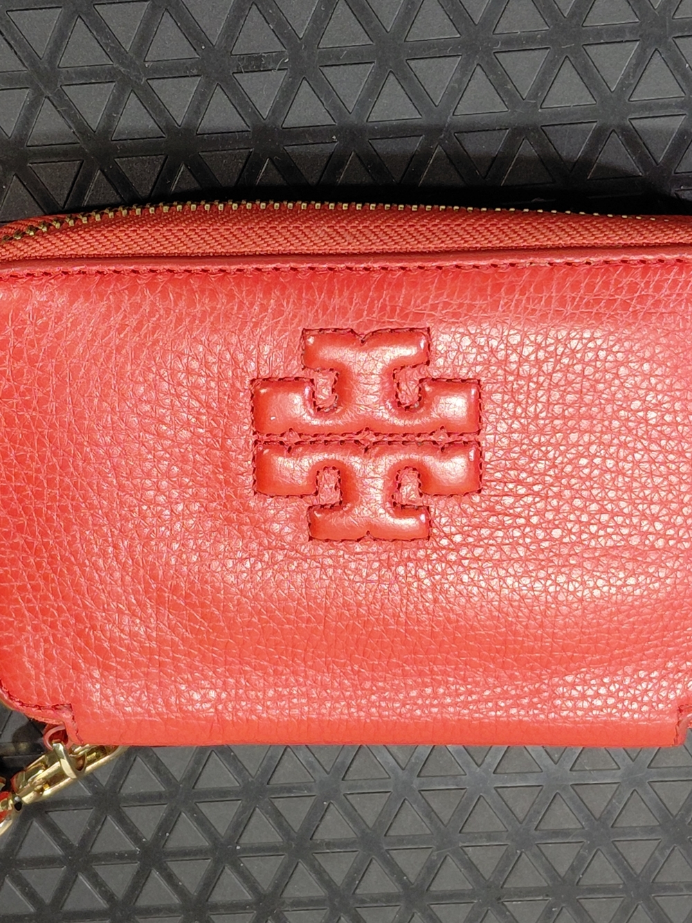 Tory Burch Thea Wristlet Wallet Crafted In Coral-Red Pebbled Premium Leather